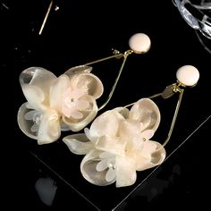 ✦ Drape yourself in the delicate sophistication of our chiffon drop earrings, showcasing a timeless flower blossom design that exudes elegance. These earrings are a perfect accessory for weddings and engagements, adding a touch of refined charm to your special day. The chiffon material creates a graceful movement, enhancing the overall allure of these classy drop earrings. Crafted for those moments of timeless beauty, let the flower blossom design symbolize the blooming love on your wedding day. Spring Wedding Jewelry With Petal Design, Spring Wedding Jewelry With 3d Flowers, Elegant Flower Jewelry For Summer, Elegant Summer Jewelry With Flower Decoration, Elegant Summer Flower Jewelry, Elegant Spring Petal Shaped Flower Earrings, Feminine Summer Wedding Earrings, Elegant Flower Jewelry For Spring, Elegant Spring Jewelry With Flower Decoration