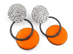 Orange drop earrings. Contemporary earrings. Geometric earrings. Circle drop earrings. Modern silver earrings. Enamel earrings. Women gift Modern orange earrings of silver and enamel. From the Pètals collection. These pieces are a one-of-a-kind handmade earrings. Measures: 45mm length and 23mm width. You can choose and customize the color of the enamel. And also the silver finish. Closure: push back. Very comfortable and lighweight. These modern earrings are ideal for to wear every day! These ge Orange Enamel Earrings As A Gift, Orange Enamel Earrings For Gift, Orange Enamel Earrings For Gifts, Black Enamel Dangle Earrings For Gift, Silver Enamel Drop Earrings, Unique Silver Enamel Earrings, Gift Black Enamel Dangle Earrings, Minimalist Silver Enamel Jewelry, Contemporary Drop Earrings For Gift