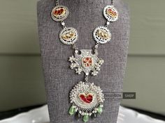 German silver navratri necklace set ,desi necklace , indian jewelery,statement necklace,Bollywood necklace,indian jewellery OCCASION: PARTY WEAR, WEDDING, MARRIAGES, CASUAL, DAILY WEAR These Earrings set have an excellent finish Ideal Gift Idea: Perfect beautiful & memorable gift for you and your loving wife, girlfriend, sister, aunt, daughter, and mom/mother/mummy. CARE Avoid Contact With Chemicals Such As Perfumes Or Any Sprays. Avoid Contact With Water. Use Butter Paper Or Cotton Cloth To Sto Festive Metal Kundan Necklace, Festive Round Kundan Necklace In Metal, Festive Round Kundan Metal Necklace, Meenakari Necklaces For Navratri Party, Traditional Metal Temple Necklace With Meenakari, Meenakari Necklace For Navratri Party, Traditional Meenakari Metal Temple Necklace, Traditional Meenakari Temple Necklace, Traditional Festival Jewelry Set With Long Necklace