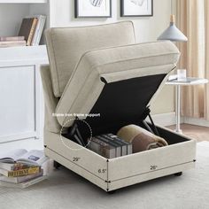 a chair that is open and sitting on the floor with books in front of it