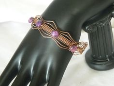 Pink crazy lace jaspers are the focal point of the copper wire wrapped bangle.  Has a lobster clasp. Wire Wrapped Bangles, Copper Wire Jewelry, Wire Wrapped Bracelet, Last Minute Gifts, Copper Wire, Wire Jewelry, Le Point, Wrap Bracelet, Wire Wrapping