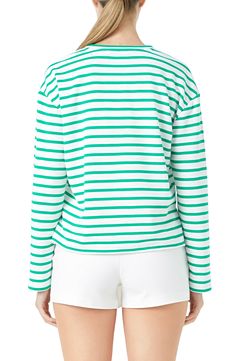 Shine bright in this striped long-sleeve top adorned with embellished patch letters decorating the front. Crewneck Long sleeves 65% cotton, 35% polyester Hand wash, dry flat Imported Spring Cotton Sweatshirt With Contrast Stripes, Spring White Sweatshirt With Contrast Stripes, White Spring Sweatshirt With Contrast Stripes, White Contrast Stripes Sweatshirt For Spring, White Sweatshirt With Contrast Stripes For Spring, Spring Striped Sweatshirt With Contrast Stripes, White Long Sleeve Sweater With Striped Hem, Spring Horizontal Stripe Long Sleeve Sweater, Spring Striped Cotton Sweatshirt