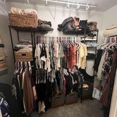 the closet is full of clothes and shoes for all kinds of people to wear in