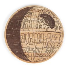 "The Star Wars Death Star Serving Board is perfect for cheese, bread, and appetizers. This durable parawood circular cutting board features a faithfully accurate depiction of the one-and-only Death Star and makes an explosively festive Star Wars addition to dinner parties, picnics, cocktail parties and any meal. The Star Wars Death Star Serving Board is perfect for cheese, bread, and appetizers. This durable parawood circular cutting board features a faithfully accurate depiction of the one-and- Disney Themed Cakes, Laser Engraving Ideas, Project Theme, Disney Furniture, Glow Forge, Dark Side Star Wars, Wood Cheese Board, Engraving Ideas, Fun Kitchen