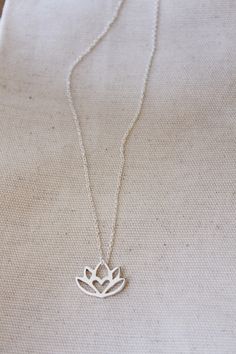 An original Lola&Cash protea necklace featuring a hidden heart -- d e t a i l s -- -protea measures 2cm wide -hand sawn out of solid sterling silver -completed in a mirror finish -includes a 45cm chain This pendant is also available in gold as seen in last picture https://www.etsy.com/listing/621948340/gold-protea-pendant-solid-9ct-yellow?ref=shop_home_active_1 -All Lola&Cash jewellery will arrive gift wrapped ---------------------------------------- Please Note - Made to order - Rush or Silver Birth Flower Necklace For Wedding, Small Minimalist Necklace As A Gift, Small Minimalist Necklace Perfect For Gifts, Minimalist Small Necklace Perfect For Gifts, Small Minimalist Necklace For Gift, Silver Birth Flower Charm Necklaces For Weddings, Delicate Silver Flower-shaped Charm Necklace, Delicate Silver Flower Shape Charm Necklace, Silver Charm Necklaces With Birth Flower For Wedding