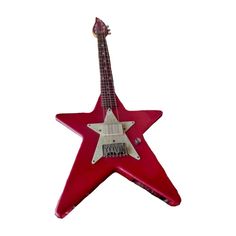 a red guitar shaped like a star