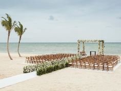 an outdoor wedding setup on the beach