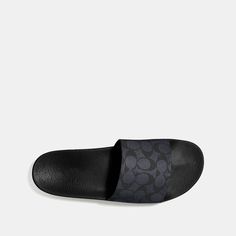 This sporty slide is crafted in our Signature canvas. A summer essential the rubber sole offers great traction on city streets and poolside. | Coach Slide Sandal Size 13 - Charcoal Signature Textured Sole Slides For Streetwear, Summer Slip-on Sport Sandals For Streetwear, Casual Slip-on Slides With Textured Sole, Comfortable Slides With Textured Sole For Streetwear, Textured Footbed Slip-on Slides For Streetwear, Casual Slip-resistant Flat Flip Flops, Casual Slip-on Flip Flops For Streetwear, Slip-resistant Slip-on Slides For Streetwear, Casual Flat Sport Sandals