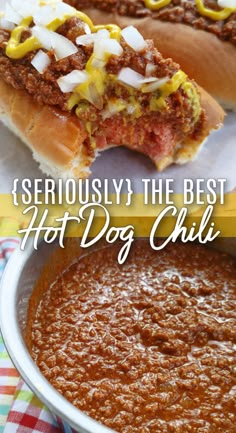 two hot dogs with chili, cheese and mustard in buns next to a bowl of chili