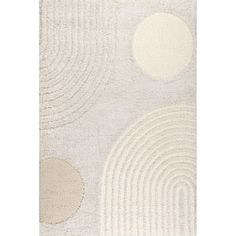 a white rug with circles on it