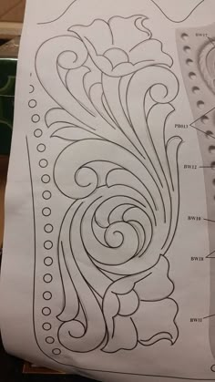 a piece of paper that has some designs on it