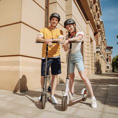 A man and a woman are standing with their Mi Electric Scooter 3 Smart Home Devices, Home Devices, Commute To Work, 5 Hours, Smart Home, Climbing, Electricity