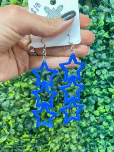 Lightweight star trio earrings Trendy Blue Dangle Earrings, Trendy Blue Dangle Jewelry, Hypoallergenic Blue Star Earrings, Blue Star Charm Drop Earrings, Blue Star Charm Jewelry For Party, Blue Star-shaped Jewelry For Party, Blue Drop Earrings With Star Charm, Trendy Star-shaped Blue Jewelry, Trendy Blue Star-shaped Jewelry