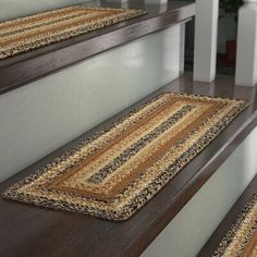 a stair mat on the bottom of some stairs