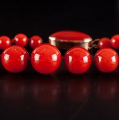 Vintage 1960's 18k Yellow Gold Natural AAA Red Coral Necklace Earring Set 57.37gMetal Information: 18k Yellow GoldTotal Weight: 57.37gNecklace Width: 12mm - 6.1mmNecklace Length: 25"Earring Dimensions: 18mm x 12.8mmCirca: 1960'sStone InformationMain StoneGem Type: CoralShape: Round Bead (12mm - 6.1mm)Color: RedClarity/Quality: AAANumber of Stones: 79Accent StonesGem Type: CoralShape: Oval Cabochon (18mm x 8.2mm)Color: RedClarity/Quality: AAANumber of Stones: 1Estimated Retail Price: $7690.00OUR Fine Jewelry Red Jewelry For Evening, Formal Red Round Beaded Jewelry, Traditional Red Jewelry For Evening, Red Round Beads Evening Jewelry, Red Round Bead Evening Jewelry, Red Round Beads Jewelry For Evening, Red Beaded Evening Jewelry, Vintage Red Jewelry For Evening, Red Coral Necklace