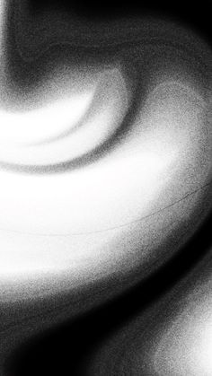 a black and white photo of an abstract background with wavy lines in the foreground