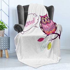 an owl is sitting on a tree branch with a thought bubble in its mouth sherpad blanket