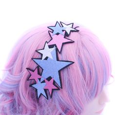 Illuminate your style with our Multi Star Burst Headband, a celestial accessory that adds a touch of sparkle to any outfit. This headband features an array of embroidered stars in various sizes and vibrant colors, including blue, pink, and white. Each star is meticulously crafted using the highest quality threads, bringing the design drawn and digitized by me to life with stunning detail and brilliance. Designed for comfort and versatility, the headband has a black elastic cord securely sewn to the back, ensuring a perfect fit for any head size. Handmade with love in my studio, this headband is a testament to fine craftsmanship and unique design. Perfect for adding a whimsical touch to your everyday look or for special occasions, this Multi Star Burst Headband is a versatile accessory that Bachelorette Party Accessories, Womens Headband, Celestial Stars, Silly Clothes, Embroidered Stars, Star Headband, Star Burst, Festival Accessories, Booth Props