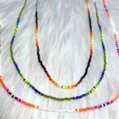 For those in search of unique jewelry crafted with exquisite beadwork, look no further than our handmade native ombre beaded necklaces. These necklaces feature a stunning ombre design that fades from light to dark, with vibrant colors that are sure to catch the eye. Not only are they visually striking, but they are also highly adjustable, ensuring a comfortable fit for wearers of all sizes. Available in three distinct color options, including Brown, Pink, and Green, these necklaces are a perfect Rainbow Beaded Crystal Necklaces With Round Beads, Adjustable Rainbow Beaded Necklace With Beaded Chain, Rainbow Necklaces With Tiny Beads For Festivals, Rainbow Tiny Beads Necklace For Festivals, Bohemian Rainbow Beaded Necklaces With Tiny Beads, Rainbow Bohemian Beaded Necklaces With Tiny Beads, Bohemian Rainbow Beaded Necklace With Tiny Beads, Rainbow Beaded Necklace For Festivals, Rainbow Beaded Necklace For Festival