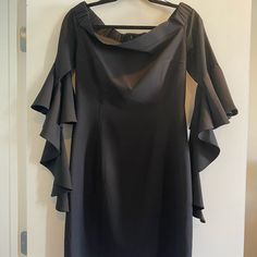 Black Gracia Off Shoulder Ruffle Sleeve Dress(Nwt) Size Medium. This Form Fitting Dress Falls Above The Knee. Neck Line Has Elastic Detail To Keep Dress In Place- Whether Wearing Off The Should Or Not. Delicate Ruffle Sleeve. Back Zipper. Stretchy And Flattering Fabric. Black Ruffle Sleeve Party Dress, Black Ruffle Sleeve Dress For Night Out, Elegant Ruffle Sleeve Midi Dress For Date Night, Evening Mini Dress With Ruffle Hem And Sleeves, Elegant Midi Dress With Ruffle Sleeves For Date Night, Black Ruffle Dress For Spring Formal, Formal Mini Dress With Ruffle Sleeves, Black Formal Ruffle Dress For Spring, Fall Evening Dress With Ruffle Sleeves