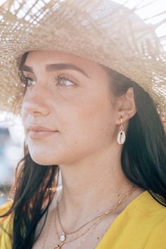 Summer is around the corner and this hoops are the perfect beach-vibe earrings. Natural cowrie seashell earrings on gold filled hoops very casual and simply amazing. Get nice complements everywhere you go! ;) *Select the kind of shells for your earrings before check out (Natural shell or Golden charm seashell) *The natural shells on your order may vary slightly from the one on the pictures due to its natural uniqueness. ---------------------------------------------------------------------------- Shell Dangle Hoop Earrings For Beach, Summer Beach Dangle Hoop Earrings, Beach Shell Jewelry With Ear Wire, Shell Jewelry With Ear Wire For Beach, Summer Vacation Hoop Earrings For Pierced Ears, Dainty Shell Jewelry For Beach, Gold Dangle Earrings For Beach Season, Gold Earrings For Beach Season, Yellow Gold Beach Earrings