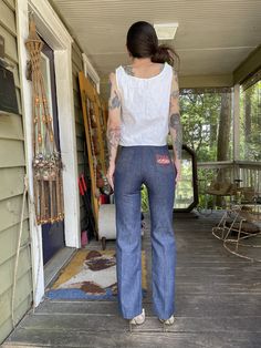 "How about a pizza dat a$$?? With these rare vintage indigo denim pizza pants! Big embroidered back pocket, straight leg fit, dark dark wash. In excellent condition with snap button and zipper closure. Waist: 26\" Hips: 33\" max, best for 32\" Rise: 11\" Inseam: 30\" Model is 5'7\" and 116 lbs with measurements of 30x24x34. These were slightly small in the hips." Embroidered Dark Wash Straight Leg Bottoms, Embroidered Straight Leg Dark Wash Bottoms, Fitted Embroidered Flare Jeans With Straight Leg, Fitted Dark Wash Embroidered Jeans, Fitted Embroidered Dark Wash Jeans, Embroidered Fitted Wide Leg Jeans, Embroidered Wide-leg Fitted Jeans, Embroidered Dark Wash Mid-rise Bottoms, Embroidered Mid-rise Dark Wash Bottoms