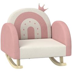 a pink and white rocking chair with a crown on it