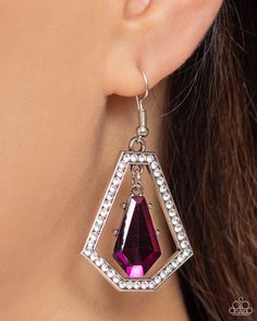 A faceted purple gem swings from the top of a trapezoidal silver frame that is dotted in glassy white rhinestones, creating a prismatic lure. Earring attaches to a standard fishhook fitting.   Sold as one pair of earrings. Faceted Drop Jewelry For Party, Elegant Purple Jewelry With Bling, Purple Jeweled Evening Jewelry, Purple Jewelry With Sparkling Stones For Party, Nickel-free Drop Jewelry For Party, Silver Faceted Earrings For Party, Faceted Crystal Jewelry For Parties, Faceted Metal Jewelry For Parties, Faceted Metal Jewelry For Party