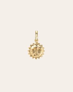 Beautifully handcrafted 14K solid yellow gold sun charm, wear it solo or add it to your build your charm necklace for a fun and chic look. Made in L.A. Size: Approx. 8mm Weight: Approx. 1 gram Ships in 3-6 business days Comes carefully packaged in a branded Zoe Lev protective sleeve. Solid Gold Charms, Sun Charm, Sun Pendant, Gold Sun, Solid Gold Jewelry, Jewelry Brand, Gold Charm, Piercing Jewelry, Solid Yellow