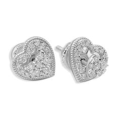 DESCRIPTION: Make a lasting impression with these beautiful 14k gold diamond heart shaped earrings. With each earring set with 6 stunning round diamonds and a Pavé border these Delicate Diamond Heart Studs make for a dazzling addition to any special-event look. The pave design cohesively joins the precious materials together into one beautiful piece while the classic heart shape is timeless and elegant.  DETAILS: Item Code EAR0159 Diamond Carat Weight .55 Ctw Diamond Clarity VS1 Diamond Color F Metal Color White Metal Type 10K Gold Item Weight 14.11 grams Width 2 inch Black Diamond Chain, Square Diamond Earrings, Mens Diamond Earrings, Black Diamond Bracelet, Diamond Solitaire Earrings, Black Diamond Earrings, Vs1 Diamond, Diamond Cluster Earrings, Solitaire Earrings