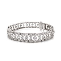 Slim vintage and Art Deco inspired diamond platinum bracelet. Adorned with white round cut diamonds in 6.12 carat total. Diamonds are all natural in G-H Color Clarity VS. Platinum 950 bracelet. Length: 17.5 cm Width. 1 cm Weight: 28.9 g [shortcode] [video] [/video] [/shortcode] Art Deco Round Diamond Bracelet Brilliant Cut, Art Deco White Gold Diamond Bracelet With Brilliant Cut, Art Deco Diamond Tennis Bracelet With Brilliant Cut, Exquisite Platinum Diamond Bracelet With Brilliant Cut, Art Deco Diamond Bracelet For Wedding, Art Deco Style Wedding Diamond Bracelet, Art Deco Diamond Jubilee Bracelet, Wedding Art Deco Diamond Bracelet, Exquisite Platinum Diamond Bracelet With Single Cut Diamonds