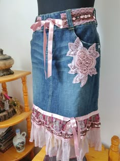 A unique stretch denim skirt in which you will feel comfortable and attract the eyes of others.Romantic boho skirt with ruffles and varios lace,tulle, crystals.satin ribbons аnd handmade textile flower with beads.The skirt closes with zipper.                                                                                                              Size:M Waist:80,Hips:100,Lenght:60цm/23inches Bohemian Long Denim Skirt, Bohemian Summer Denim Skirt, Bohemian Denim Skirt For Summer, Summer Bohemian Denim Skirt, Fitted Bohemian Cotton Denim Skirt, Bohemian Cotton Denim Skirt For Festival, Bohemian Denim Skirt For Festival, Fitted Bohemian Denim Skirt, Bohemian Denim Skirt With Patchwork