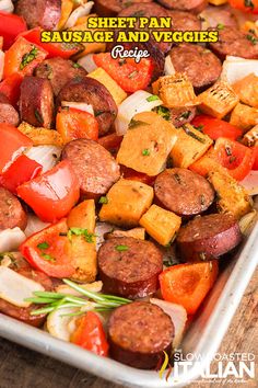 sausage and veggies on a sheet pan ready to be cooked in the oven