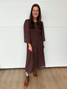 Embrace elegance with the Olivia Long Sleeve Floral Maxi Dress. This stunning maxi-length dress features a sweetheart illusion neckline + sheer balloon sleeves with gathered elastic cuffs, creating a chic + sophisticated look. The shirring along the bodice + waist ensures a flattering fit, while the tiered skirt adds a graceful, flowy silhouette. The chic + feminine floral print is perfect for any occasion, while the keyhole back adds a playful touch. Whether you're attending a wedding or a spec Fall Dresses With Blouson Bishop Sleeves, Modest Maxi Dress With Smocked Cuffs, Elegant Fall Maxi Dress With Smocked Cuffs, Casual Puff Sleeve Maxi Dress For Fall, Fall Dresses With Billowy Blouson Sleeves, Chic Dress With Balloon Sleeves And Smocked Cuffs, Chic Dress With Smocked Cuffs And Balloon Sleeves, Chic Balloon Sleeve Dress With Smocked Cuffs, Chic Flowy Maxi Dress With Smocked Cuffs