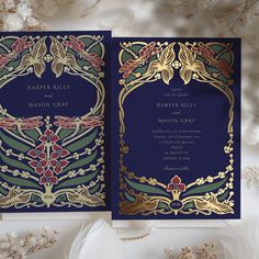 This splendid Art Nouveau wedding invitation is a true masterpiece, boasting an opulent burgundy and navy blue color scheme with luxurious gold foil accents. The front design features symmetrical dragonflies with gossamer wings and an array of stylized botanical motifs, framing the couple's initials amidst a regal navy backdrop. The year is seamlessly woven into the vintage-style composition, symbolizing the couple's union. On the reverse, the invitation continues the theme of sophisticated elegance, with all pertinent wedding details presented in a harmonious and richly colored setting. This invitation is the epitome of classic elegance, perfect for couples who wish to announce their wedding with a touch of historical grandeur and romance. Purple Art Deco Wedding, Art Nouveau Invitation, Elegant Typeface, Dragonfly Wedding, Art Nouveau Wedding Invitation, Art Nouveau Wedding, Nouveau Wedding, Art Nouveau Weddings, Navy Blue Art