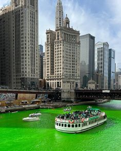 a boat full of people is in the green water