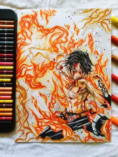 a drawing of an anime character on fire with colored crayons next to it