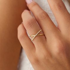 14k Gold Criss Cross Diamond Ring / Criss Cross Ring For Women / Solid Gold Statement Ring / Trendy Petite Dainty Diamond Ring by Ferkos ▶Item Details * Made to Order * Gold Kt: 14K (also available in 18K) * Available Gold Colors: Rose Gold, Yellow Gold, White Gold * Widest Part: 7.5MM * Round Diamond: 23 Pcs 1.0 MM * Diamond Color & Clarity: G Color SI Clarity * Diamond Ctw: 0.12 ctw * Ready to Ship in 3-10 Business Days ▶ See more of our Diamond Wedding Rings here - https://etsy.me/3YbpVq2 ▶ See our storefront here - http://etsy.me/2lUcVnH  ▶ All store sections here * Diamond Rings - http://etsy.me/2lwKUl8 * Diamond Earrings - http://etsy.me/2lyqVBP * Diamond Necklace - http://etsy.me/2mqa6O1 * Diamond Bracelets - http://etsy.me/2mVrAB5 * Diamond Wedding Rings - https://etsy.me/3YbpVq2 * Gold Open Band Jewelry With Pave Setting, Fine Jewelry With Pave Setting And Open Band, 14k Gold Open Ring With Pave Setting, Yellow Gold Open Ring Jewelry With Pave Setting, Open Band Ring With Pave Setting As Gift, Yellow Gold Bypass Ring With Vs Clarity For Promise, Open Band Ring With Pave Setting For Gift, Pave Setting Open Band Ring As A Gift, Gold Diamond Bypass Ring With Open Band