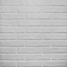 a black and white photo of a brick wall with no mortar or mortars on it