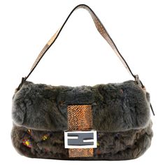 Rare Fendi baguette in fur color grey + python leather color orange, with embroidered multicolored mini stones, internal in silk color orange, silver hardware. Collector piece. Condition: Really good, to note: slight scratches on front logo. Packing/accessories: Dustbag. Measurements: 27cm x 15cm x 6cm Luxury Winter Shoulder Bag, Designer Evening Bags For Winter, Fendi Mini Bag, Fendi Fur, Fendi Mini, Vintage Designer Bags, Sequin Bag, Fur Bag, Fendi Baguette