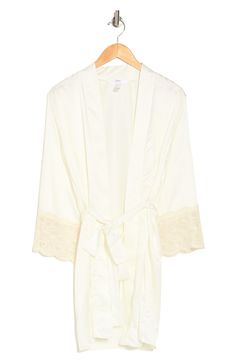 Lace trim adds intimate detail to this soft and smooth cover-up robe perfect for at-home comfort. 35" length Open front Long sleeves Tie front closure 100% polyester Hand wash Imported Flora Nikrooz, Swim Cover, Front Open, Nordstrom Rack, Lace Trim, Cover Up, Hand Wash, Nordstrom, Long Sleeves