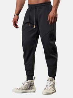 Elevate your athleisure game with our Cropped Joggers With Drawstrings. Crafted from premium polyester, these joggers provide a soft feel for all-day comfort. The cropped design adds a modern twist to your outfit, while the drawstring waist allows you to adjust the fit to your preference. Whether you're running errands or going for a jog, these joggers offer the perfect combination of style and functionality. Specifications: Material: Polyester Package included: 1*Pants Size Chart (inches): Size Sportswear Jogging Pants With Drawstring, Sportswear Pants With Drawstring For Jogging, Athleisure Gym Pants With Drawstring, Athleisure Drawstring Pants For Gym, Sportswear Sweatpants With Drawstring For Gym, Sports Activewear With Drawstring Long Pants, Drawstring Long Pants Activewear For Sports, Drawstring Sweatpants For Sports, Sports Sweatpants With Drawstring