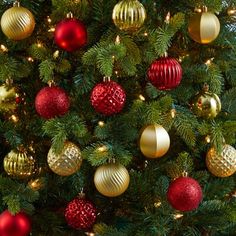 a christmas tree with red and gold ornaments