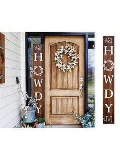 the front door is decorated with wreaths and welcome signs