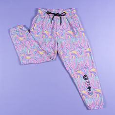 Keep warm and comfy with our Weird N Wavy Joggers. The joggers feature a custom-printed pattern and four printed icons on the lower left leg 80% cotton / 20% polyester fleece 100% polyester lining Sporty Pink Bottoms With Graphic Print, Sporty Pink Graphic Print Bottoms, Casual Pink Bottoms With Graphic Print, Pink Sporty Bottoms With Graphic Print, Casual Pink Pants With Graphic Print, Casual Multicolor All-over Print Pants, Casual Multicolor All Over Print Pants, Casual Multicolor Pants With All Over Print, Pink Graphic Print Pants For Streetwear