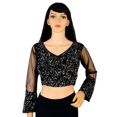 Item Description Beautiful Women's Velvet Sequins V-Neck Net Sleeves Ethnic Designer Blouse Fabric:-Velvet Sequins Color:-Black Sale For:-1 Blouse Closure Type:-Back Hook & Eye With Dori Sleeves Type:-3/4 Sleeves Neck Style:-V-Neck Product:-Padded Blouse With Cotton Inner Lining Care Instructions:-Hand Wash or Dry Clean Only Disclaimer:-The Actual Color Of The Product Slightly Vary From The Image Due To Photographic Light Or Monitor's Display. Measurement Sleeves Length:-21.5 Inch Front Neck Depth :-8 Inch Back Neck Depth :-11.5 Inch Ethnic Sequins Work Velvet Designer Blouse Net Sleeves To Give Yourself A Splendid Traditional Makeover! A Perfect Match For Your Grand Sarees.Pair This Blouse With Any Type Of Saree In Various Occasions. This Would Be Classy Yet Fashionable Choice For Wedding Traditional V-neck Sharara For Party, Bollywood V-neck Sets With Sequins, Festive V-neck Choli With Mirror Work, Festive Pre-draped V-neck Saree With Unstitched Blouse, V-neck Georgette Blouse For Reception, Georgette V-neck Blouse With Zari Work, Party V-neck Georgette Pre-draped Saree, Party V-neck Pre-draped Georgette Saree, Anarkali V-neck Choli For Festivals