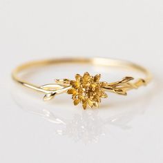 Delicate Flower-shaped Birthstone Jewelry, Dainty Flower-shaped Birthstone Jewelry, Delicate Flower Shaped Birthstone Jewelry, Rose Gold Flower Shaped Birthstone Jewelry, Minimalist Flower Shaped Birthstone Jewelry, Yellow Gold Jewelry With May Birth Flower, Delicate May Birthstone Jewelry, Elegant Flower-shaped Birthstone Rings, Delicate Jewelry With May Birthstone And Birth Flower