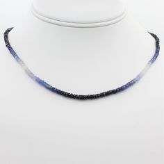 Description Whether you're looking for a pop of color for your everyday look, or you've been on the hunt for the perfect "something blue", our Beauty in Blue Choker is just what you've been searching for.Featuring over 40 carats of ombre blue and white faceted sapphire beads, this adjustable choker is a true stunner from all angles, with the heavily faceted beads catching the light at every angle. Item Details Want something a bit longer? Let us know. We can customize an ombre necklace for you i Blue Faceted Everyday Necklace, Everyday Blue Faceted Necklace, Everyday Blue Sapphire Jewelry, Sapphire Choker, Ombre Necklace, Blue Choker, Sapphire Beads, Creating Jewelry, Blue Ombre