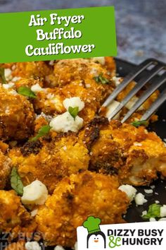 a close up of a plate of food with a fork in it and the words air fryer buffalo cauliflower