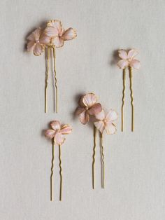 The Florence Hair Pin Set is a dash of sweetness for your tresses. Varying shapes and sizes of ruffled flowers with layers of blush and rose colors are applied by hand accented with golden edges and Swarovski pearl centers for the ultimate finishing touch. Wear using one, two, or all of the pins. Versatile styling ensures these will become a wardrobe staple whenever you want a little something extra in your hair. All flowers are created by hand, sculpted in our studio. Shipping and Production Get Your Power Back, Garden Outfit, Printable Self Care, Rose Colors, Flower Hair Pieces, Floral Hair Pins, Flower Hair Pins, Power Back, Self Care Checklist